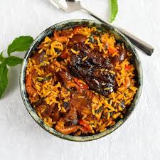 Native Rice, plantain and Chicken 